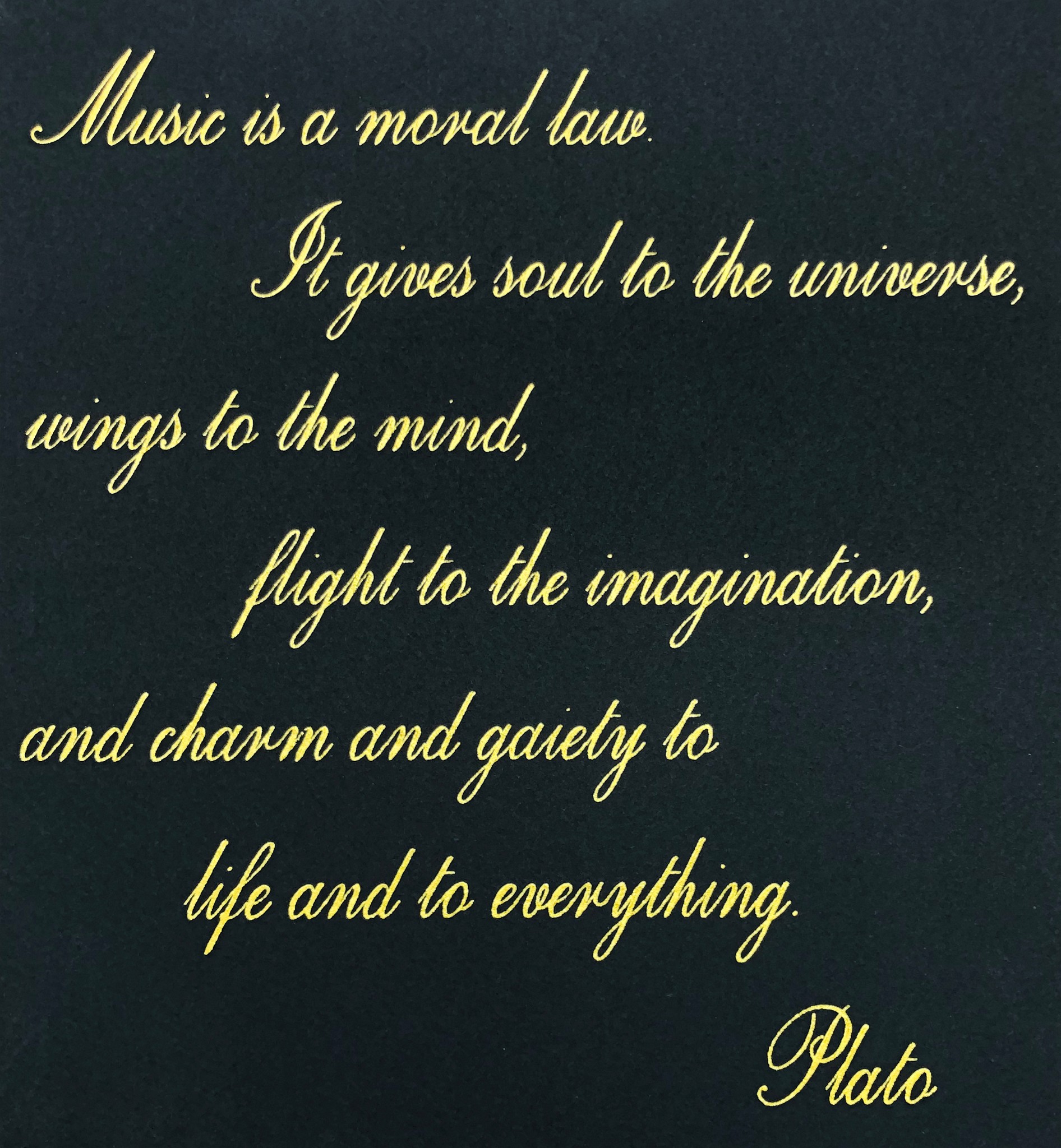 Calligraphy of Plato's music quote